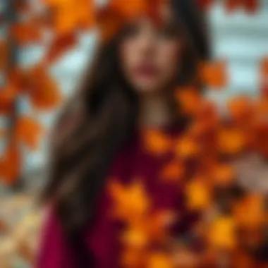 Cozy Autumn Vibes with Burgundy A cozy scene featuring a burgundy sweater beside autumn leaves