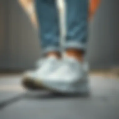 White sports shoes paired with casual attire