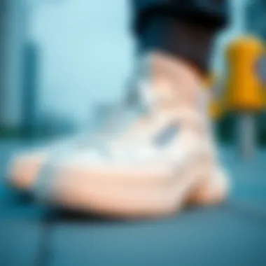 A close-up of white sports shoes highlighting craftsmanship