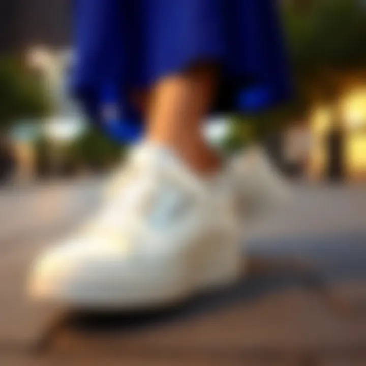 Fashionable blue dress styled with trendy white sneakers