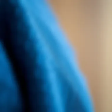 Close-up of blue sweater fabric showcasing its texture