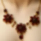 Artistic representation of pomegranate flower necklace design.