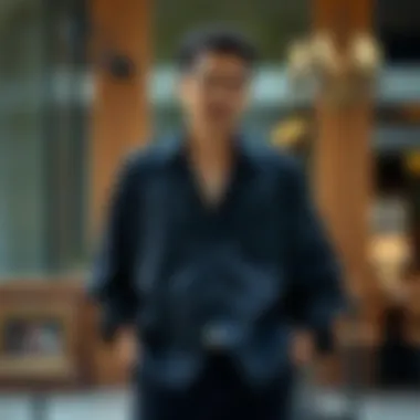 The Elegance of Oversized Black Shirts Elegant oversized black shirt draped on a stylish backdrop