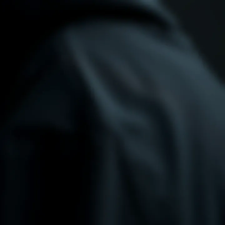 Fabric Details of a Black Hooded Jacket Close-up of fabric texture of a black hooded jacket